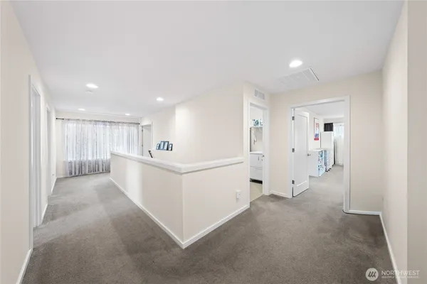 a view of a hallway with closet