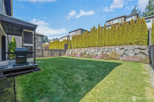 a view of a back yard of the house