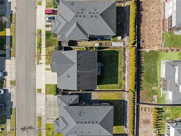 a aerial view of a house with a swimming pool