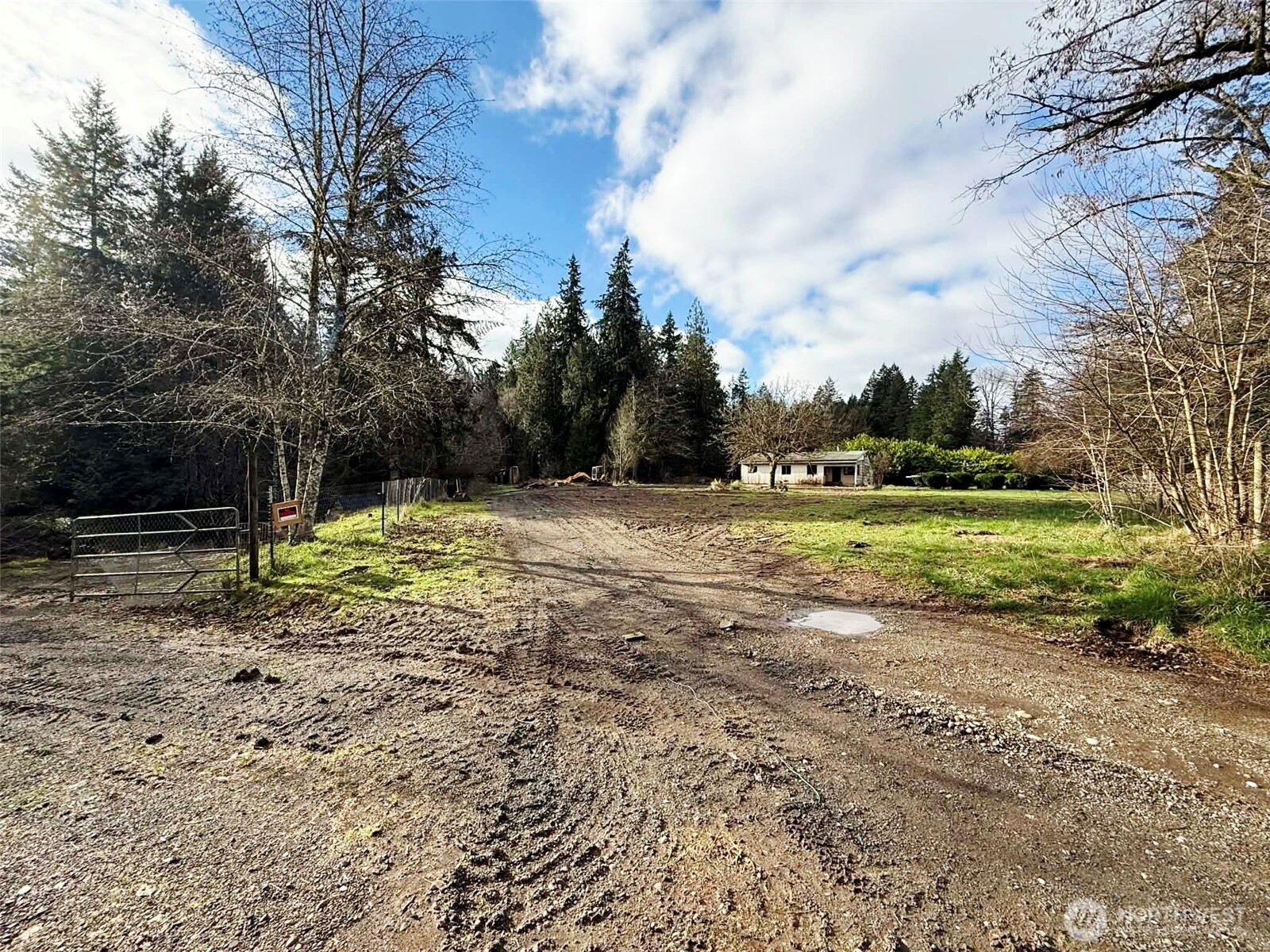 128 South Union Road Elma, WA 98541 - Photo 31 of 33 a view of a field with trees in the background