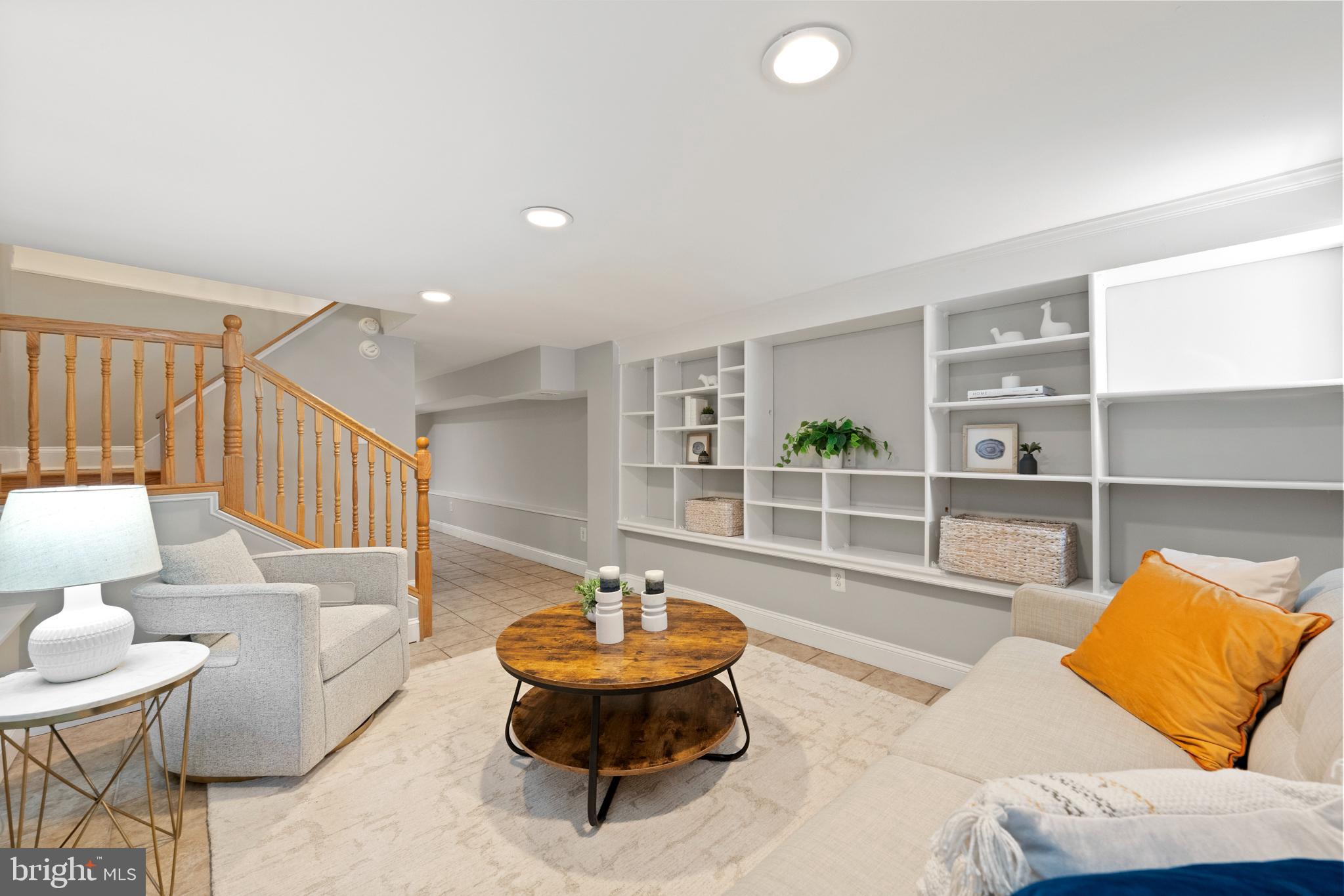 718 13th Street Northeast Washington, DC 20002 - Photo 16 of 35 a living room with furniture and a wooden floor