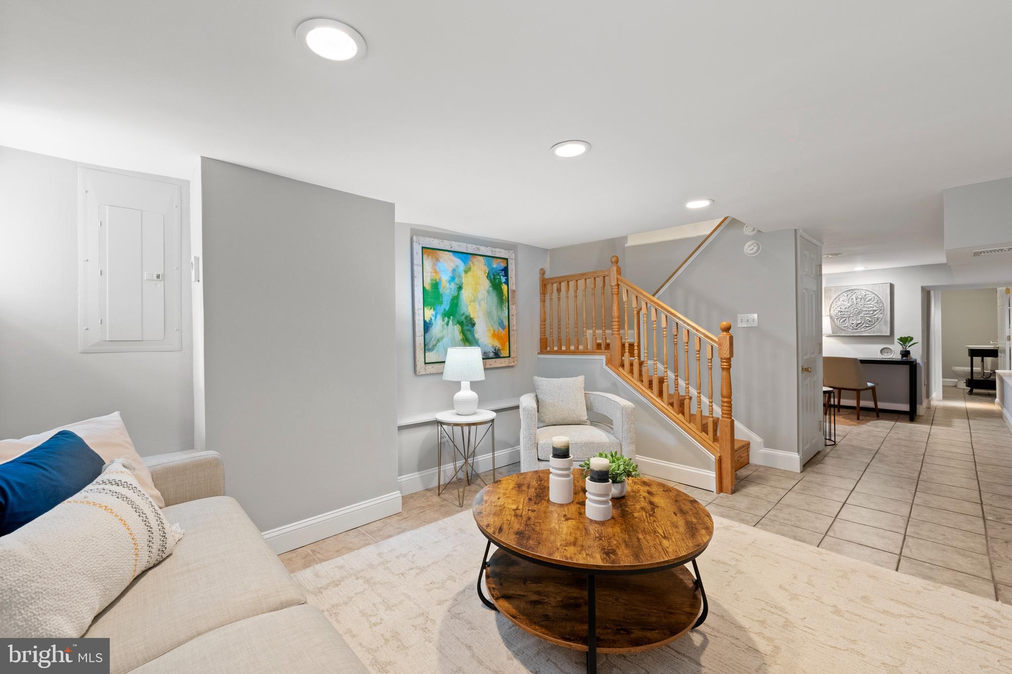 718 13th Street Northeast Washington, DC 20002 - Photo 17 of 35 a living room with furniture and a potted plant