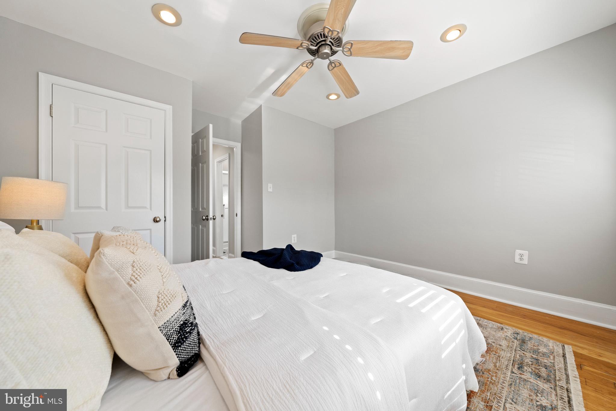 718 13th Street Northeast Washington, DC 20002 - Photo 26 of 35 a bedroom with a bed and a chandelier
