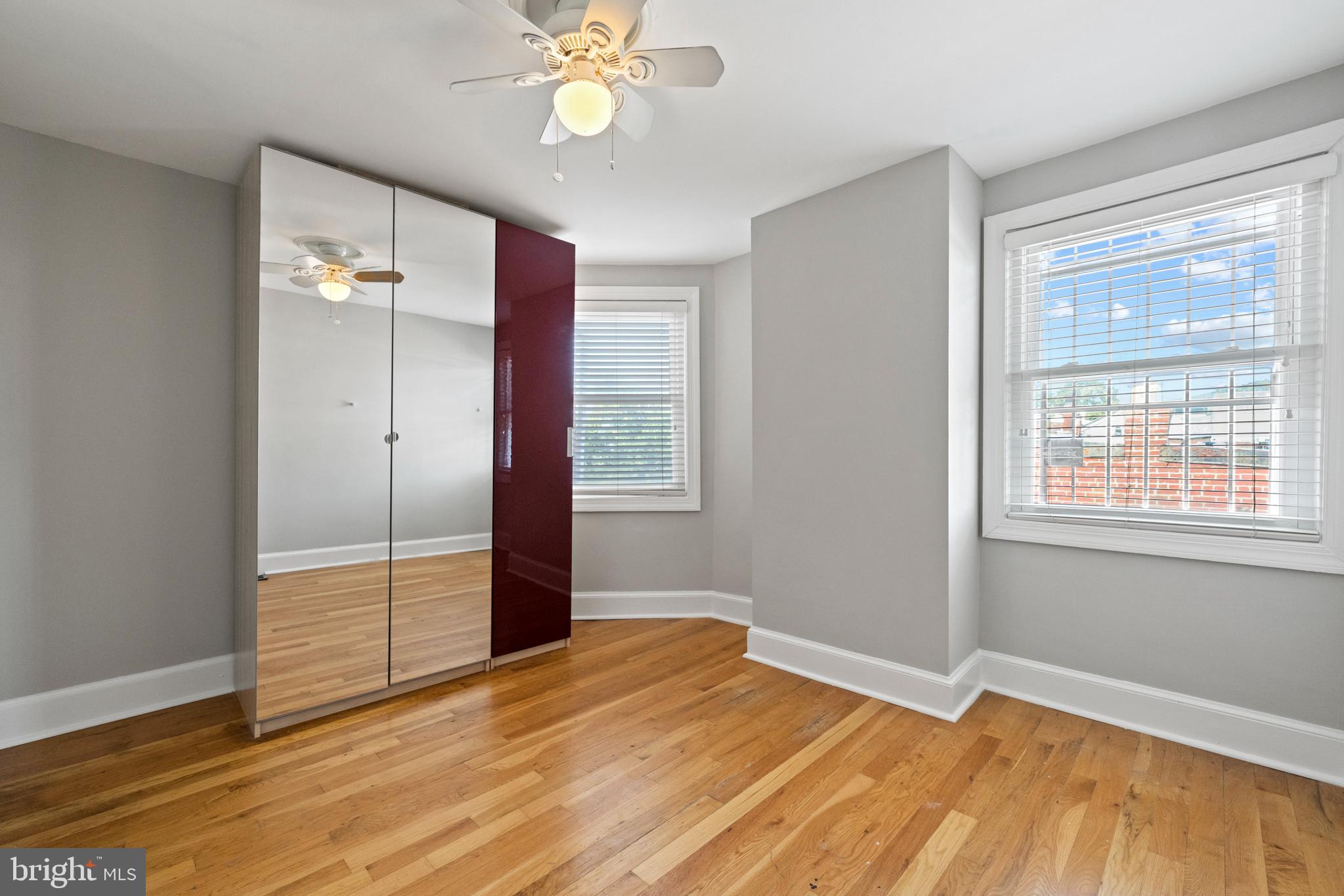 718 13th Street Northeast Washington, DC 20002 - Photo 30 of 35 a view of an empty room with wooden floor and a window
