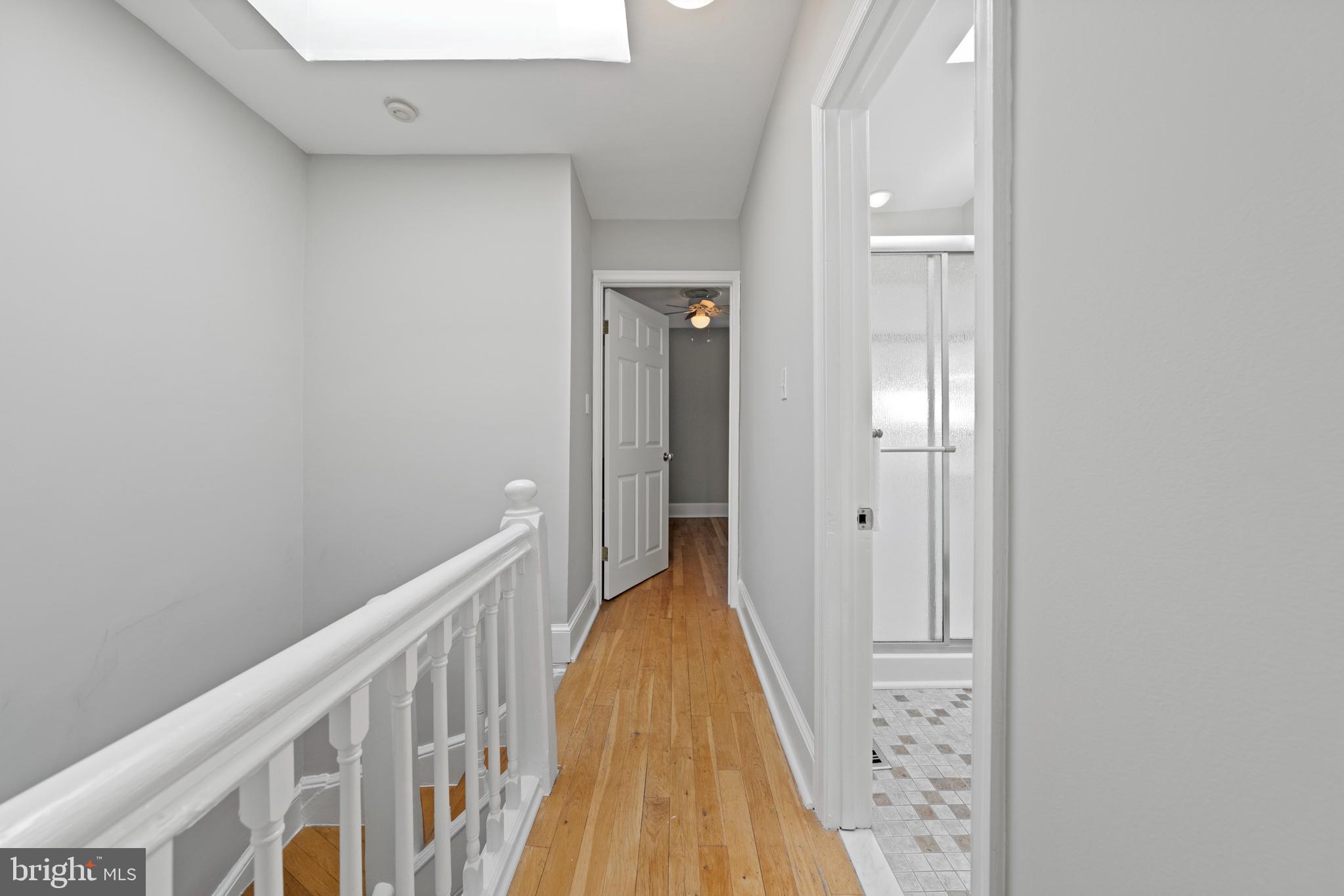 718 13th Street Northeast Washington, DC 20002 - Photo 31 of 35 a view of a hallway with wooden floor and staircase