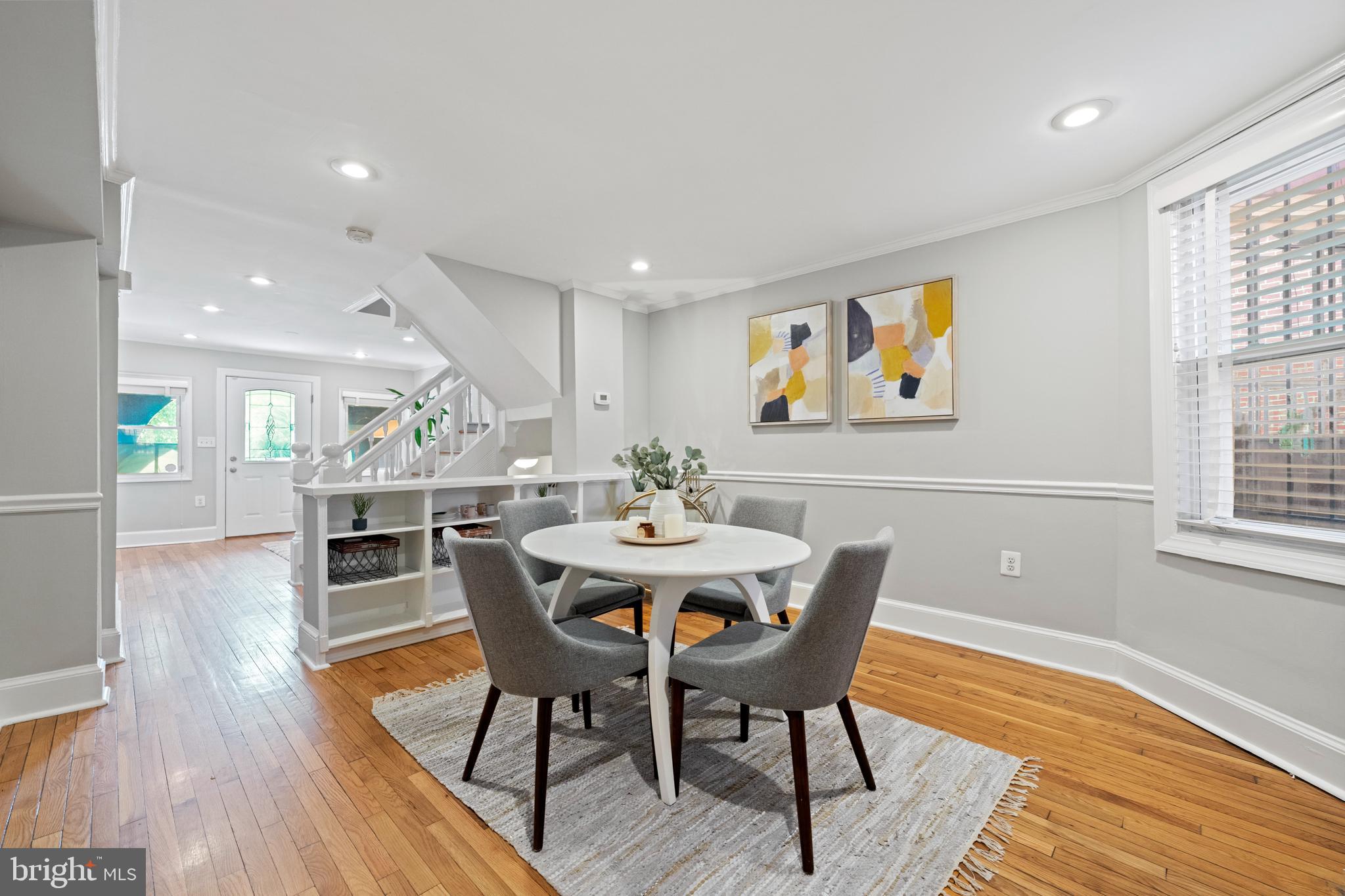 718 13th Street Northeast Washington, DC 20002 - Photo 5 of 35 a view of a dining room with furniture and wooden floor