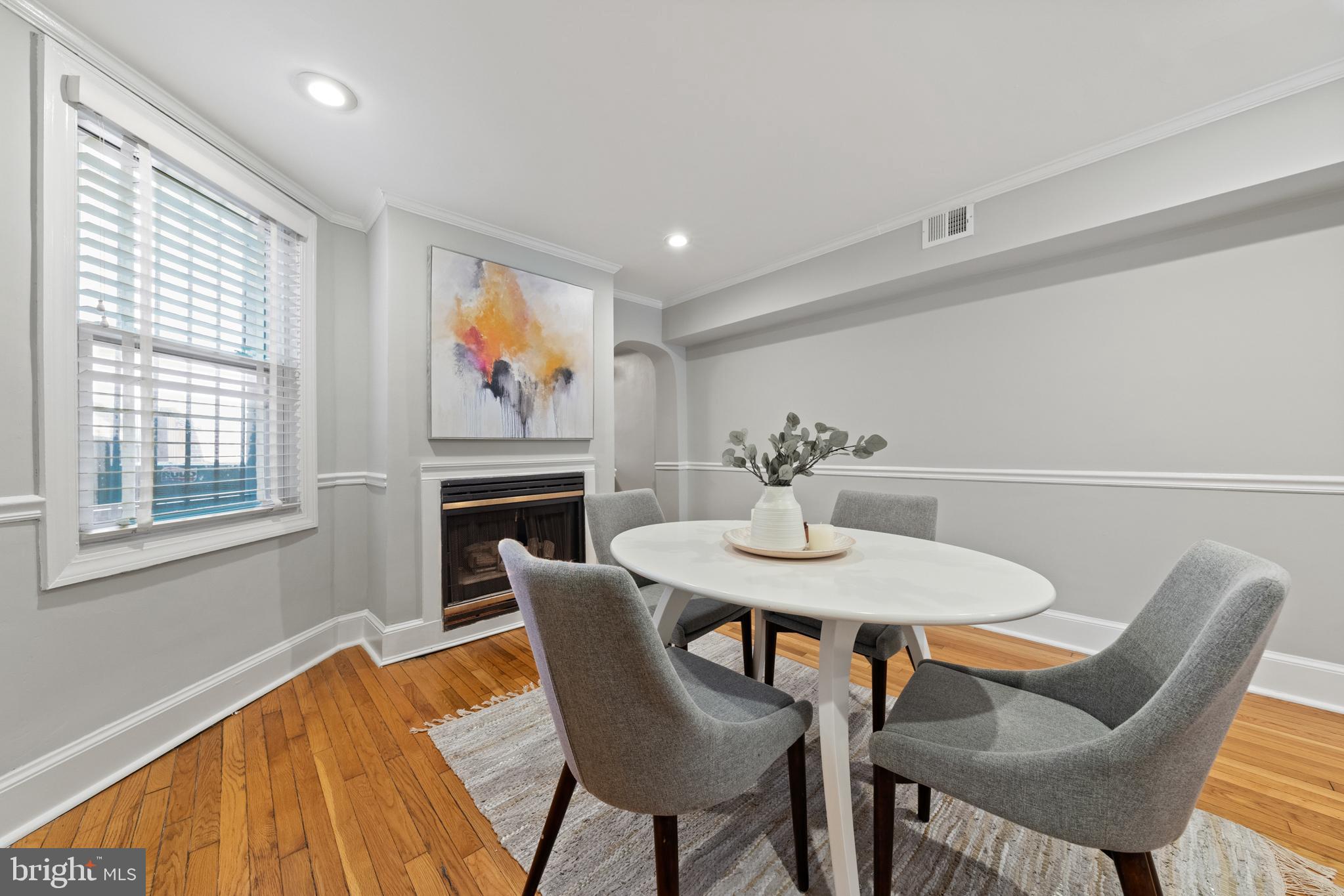 718 13th Street Northeast Washington, DC 20002 - Photo 7 of 35 a view of a dining room with furniture window and wooden floor