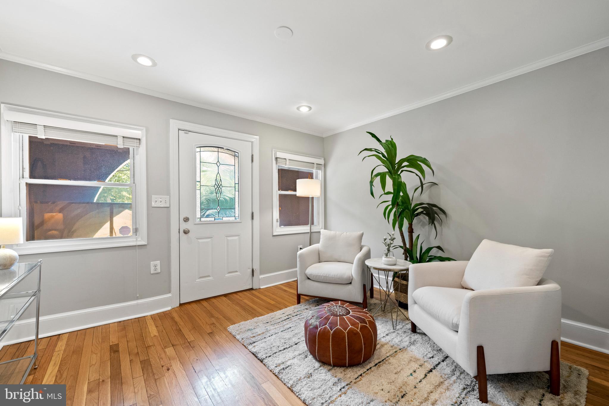 718 13th Street Northeast Washington, DC 20002 - Photo 8 of 35 a living room with furniture and a wooden floor