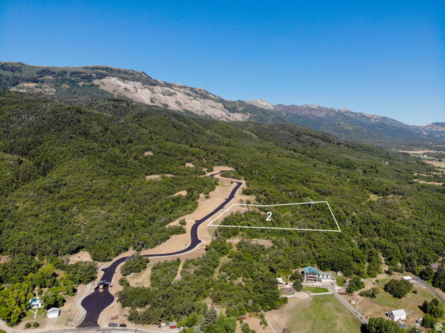 2808 East Arrowleaf Lane, Unit 2 Eden, UT 84310 - Photo 1 of 15 Aerial view of property's location featuring property parcel outlined and a mountain backdrop