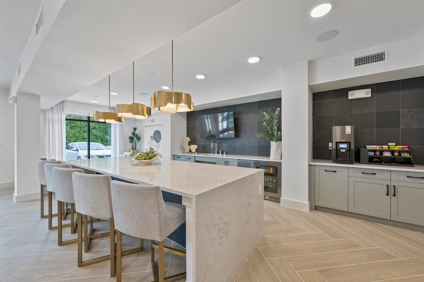 1888 Brittmoore Road, Unit 1220 Houston, TX 77043 - Photo 3 of 16 a large kitchen with a table and chairs