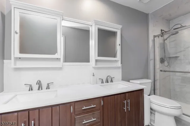 a bathroom with a sink and a toilet