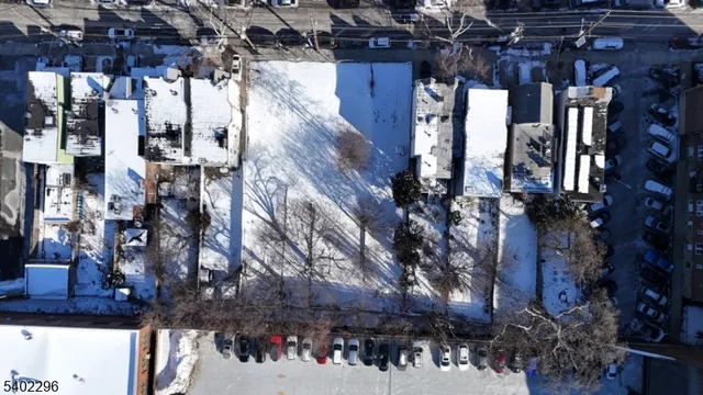 a view of a house with a tree