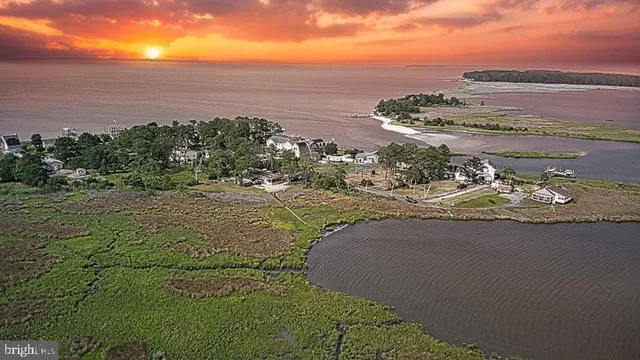 a view of a lake with a yard
