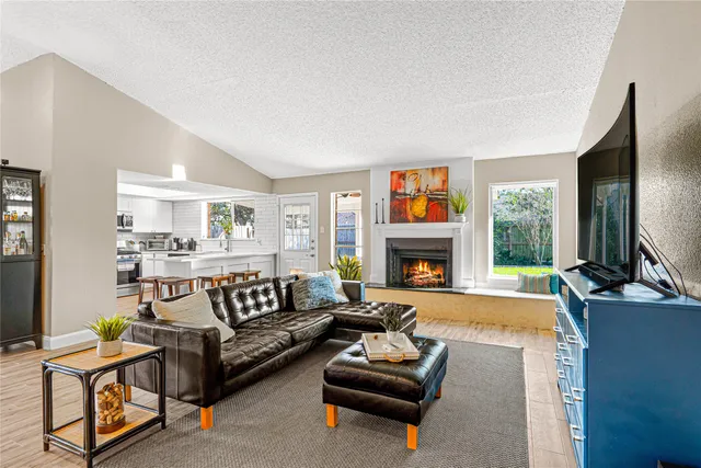 a kitchen with a sink cabinets and counter top space