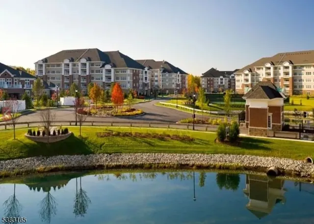 a view of a lake with a building in the background