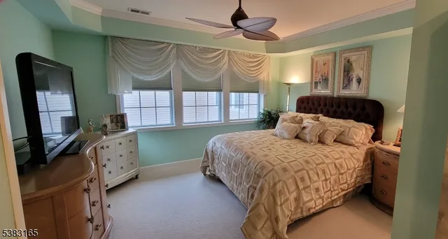 a view of a hallway and a mirror