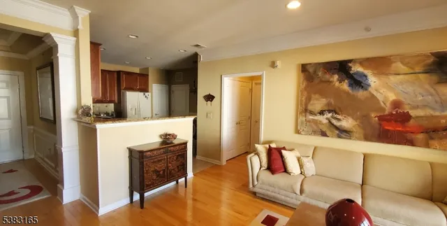 a view of a hallway with seating area