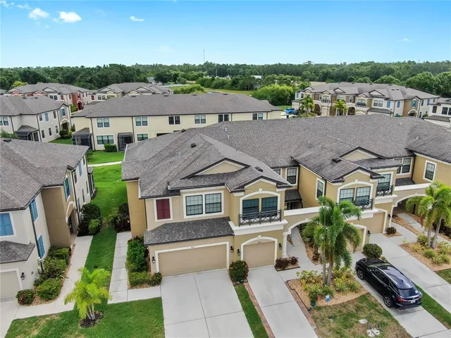 a aerial view of a house with a big yard