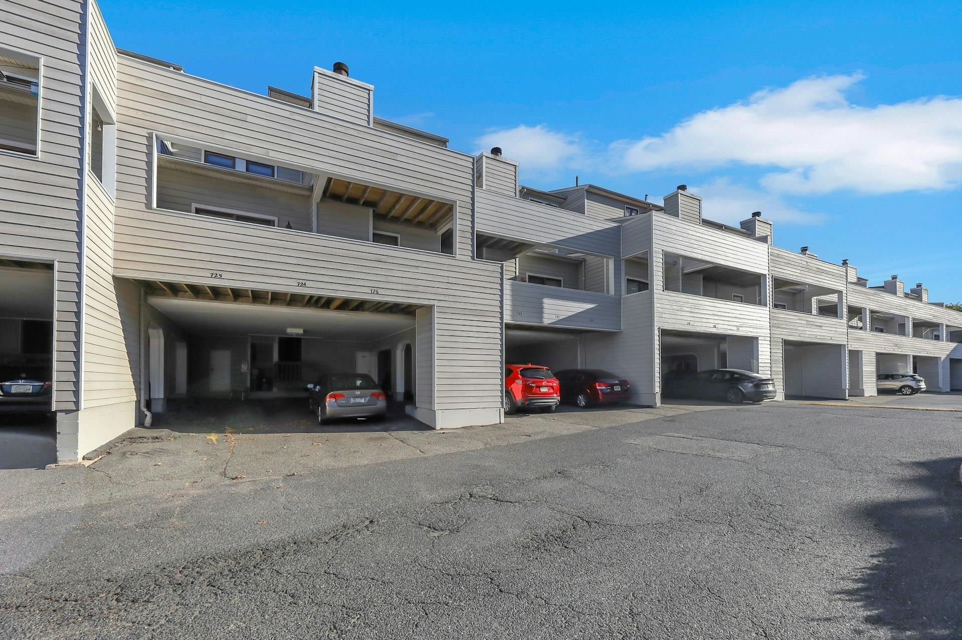 726 Mainsail Lane, Unit MAINSAIL LANE Secaucus, NJ 07094 - Photo 2 of 39 a view of a large building with many windows