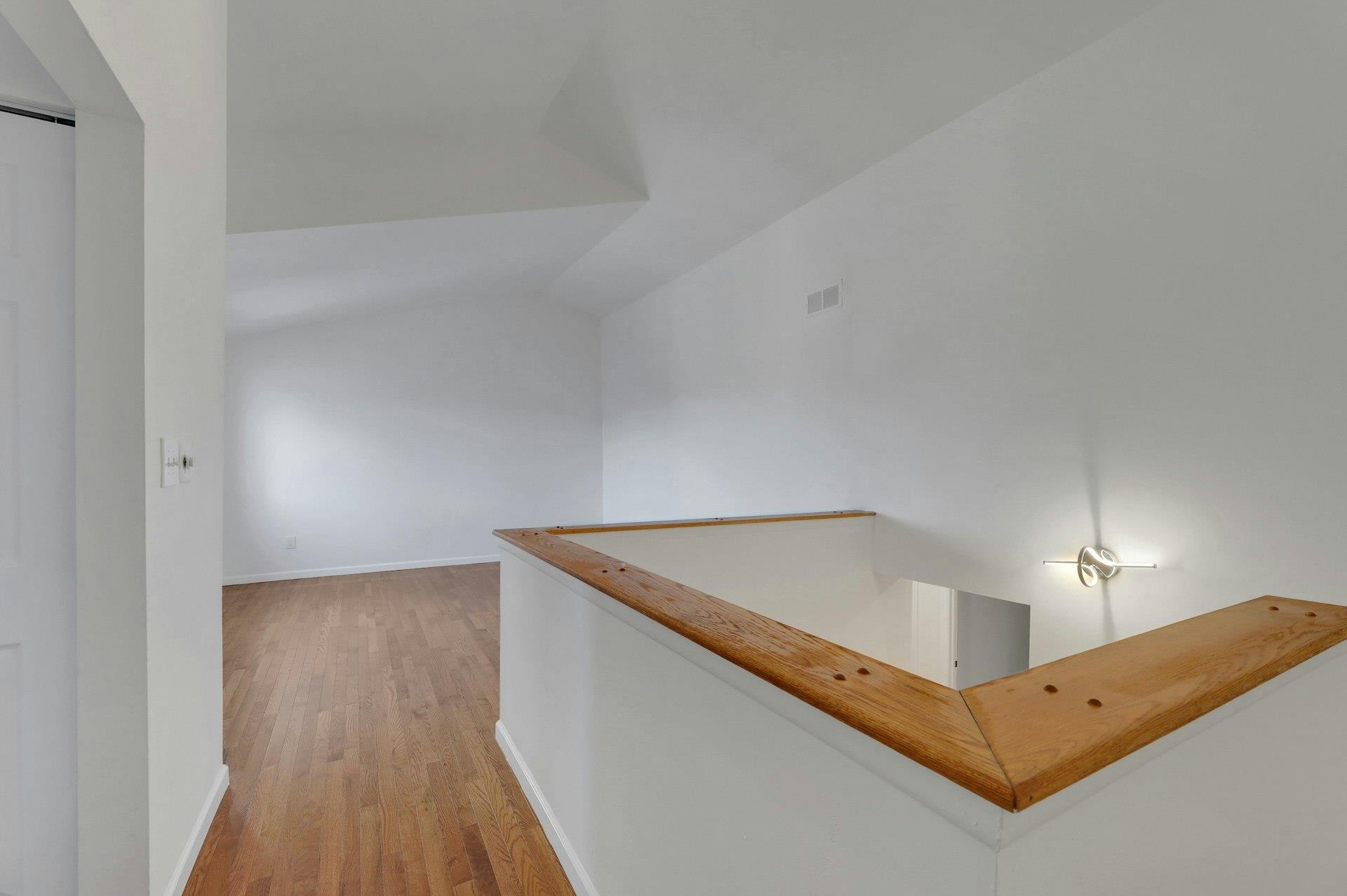 726 Mainsail Lane, Unit MAINSAIL LANE Secaucus, NJ 07094 - Photo 36 of 39 a view of kitchen and wooden floor