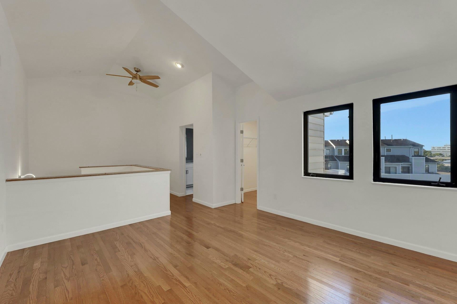 726 Mainsail Lane, Unit MAINSAIL LANE Secaucus, NJ 07094 - Photo 37 of 39 a view of empty room with wooden floor
