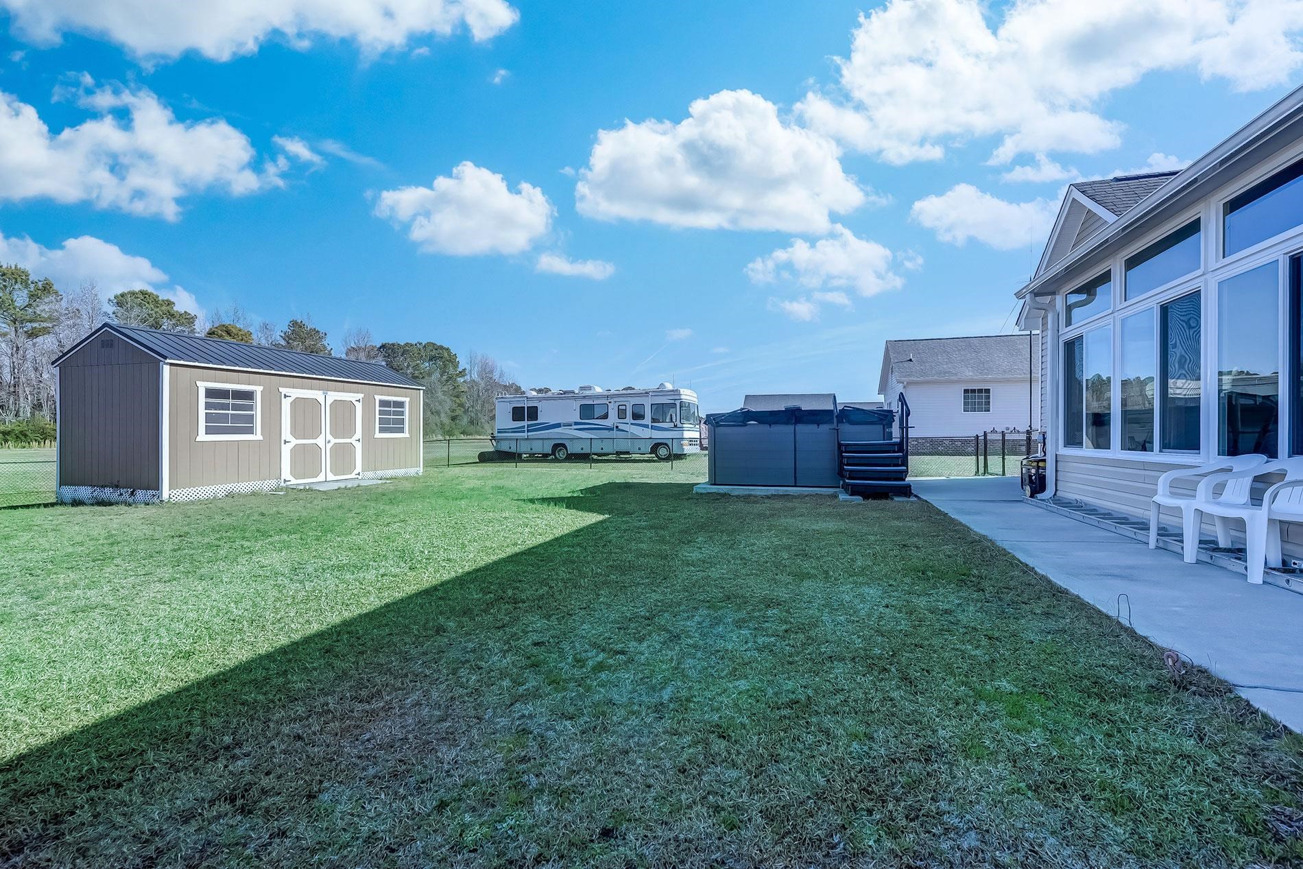 209 Highmeadow Lane Aynor, SC 29511 - Photo 4 of 4 View of yard featuring a storage shed
