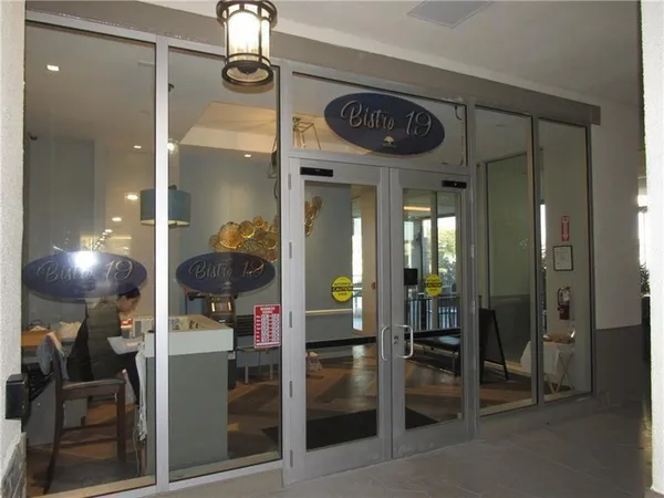 a view of a hallway with elevator