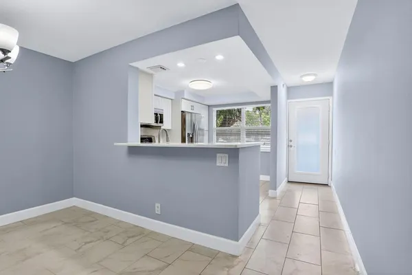a view of kitchen with windows