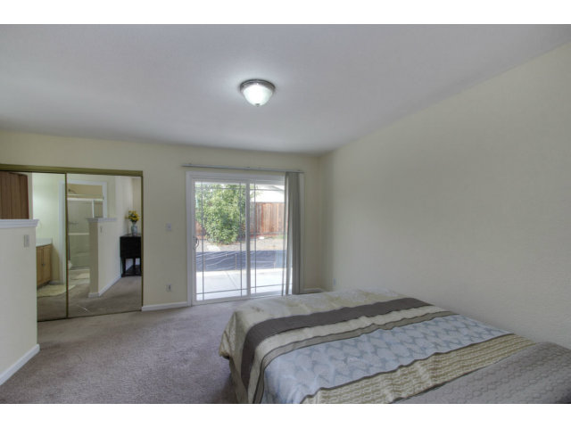 2801 Bridgeport Avenue San Ramon, CA 94583 - Photo 8 of 16 a bedroom with a bed and a window