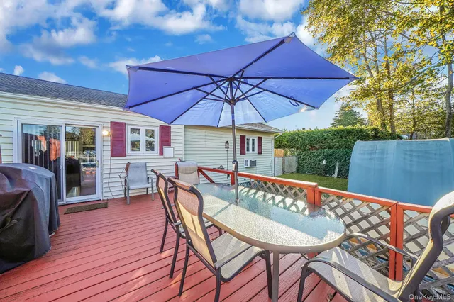 a view of a swimming pool with a yard