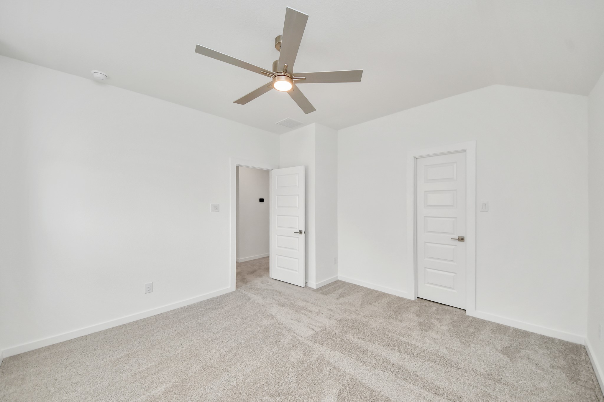 3106 Native Spg Drive Spring, TX 77373 - Photo 41 of 47 Secondary bedroom features plush carpeting, large windows that let in plenty of natural light, bright paint, and spacious closets.