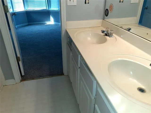 a bathroom with a sink and a tub