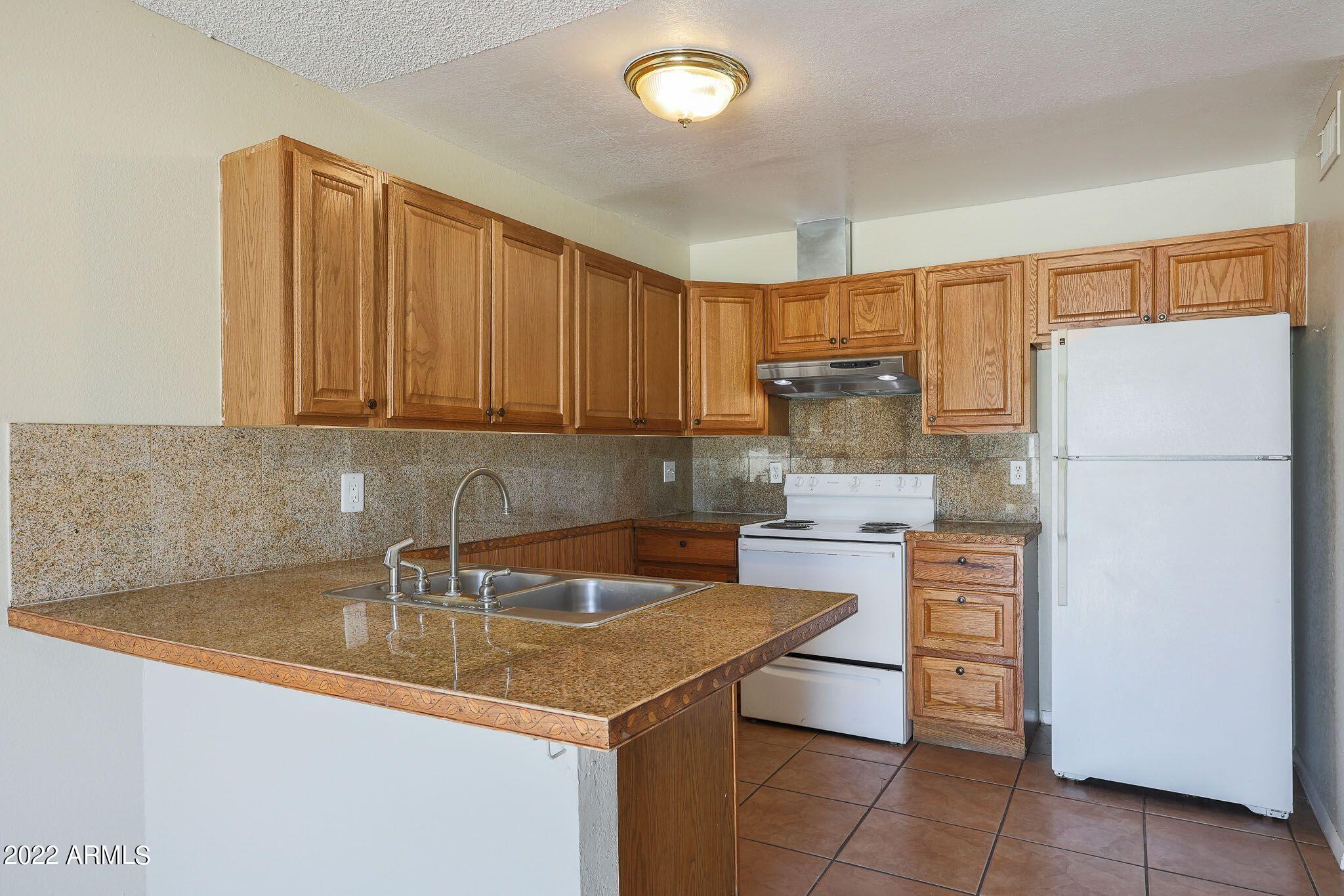 1602 West Carson Road Phoenix, AZ 85041 - Photo 9 of 19 KITCHEN