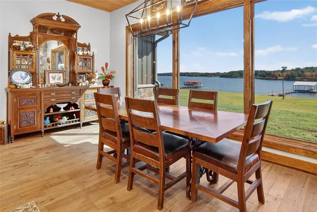 a view of a livingroom with furniture and a flat screen tv