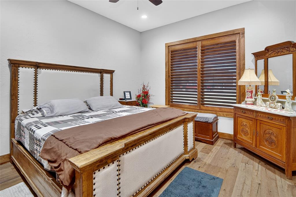 3016 W Highway Quitman, TX 75783 - Photo 16 of 40 a bedroom with a bed and a dresser
