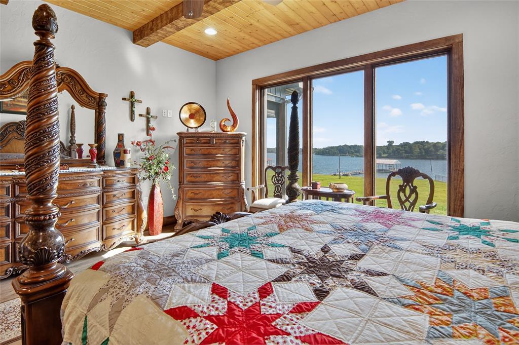 3016 W Highway Quitman, TX 75783 - Photo 20 of 40 a bed sitting in a bedroom next to a window