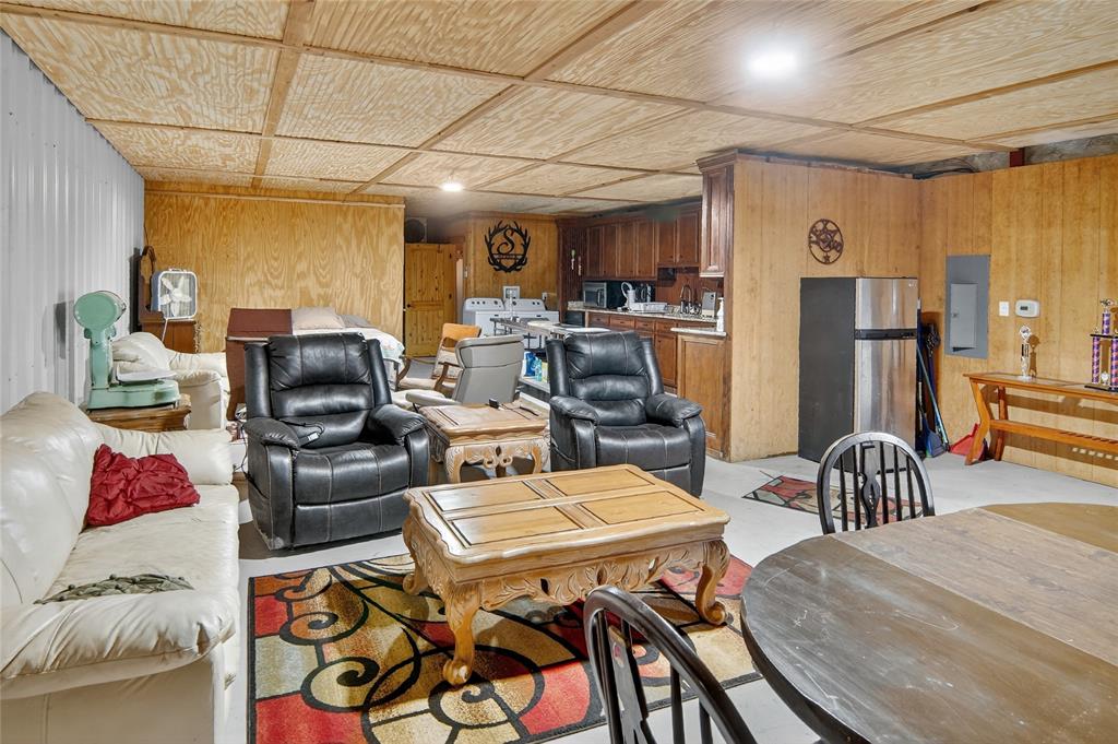 3016 W Highway Quitman, TX 75783 - Photo 28 of 40 a living room with furniture and a table