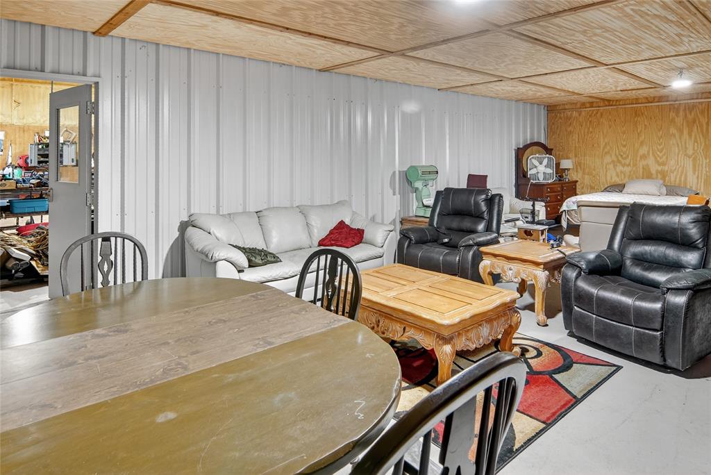 3016 W Highway Quitman, TX 75783 - Photo 29 of 40 a room with furniture a rug and a window