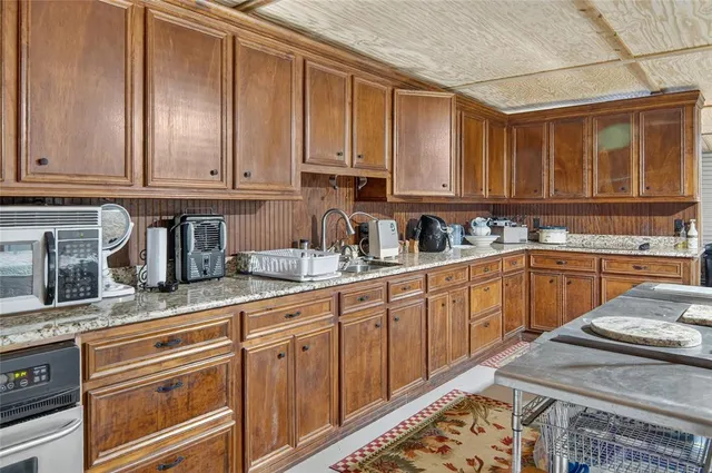 a view of a lake with houses in the background