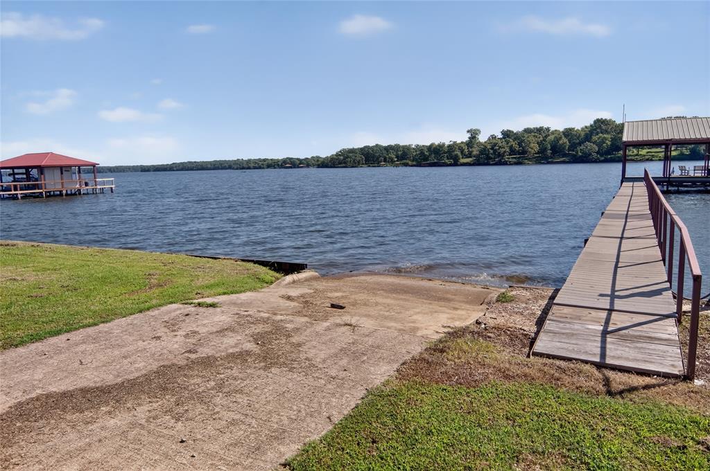 3016 W Highway Quitman, TX 75783 - Photo 34 of 40 a view of a lake and outdoor space