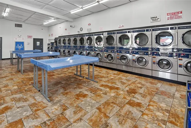 a utility room with dryer and washer
