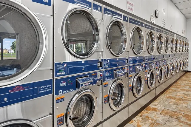 a view of a workspace with furniture