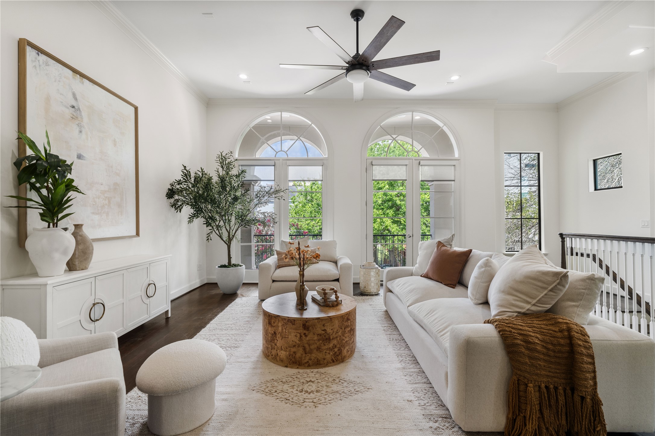 908 Thompson Street Houston, TX 77007 - Photo 2 of 45 Beautiful arched windows and French doors fill the second floor living room with natural light.
