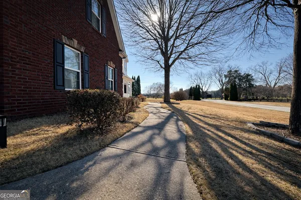 a view of a pathway of a building from a balcony