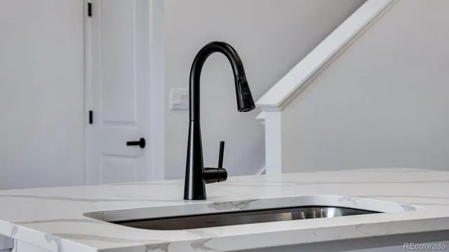 a close view of sink and mirror