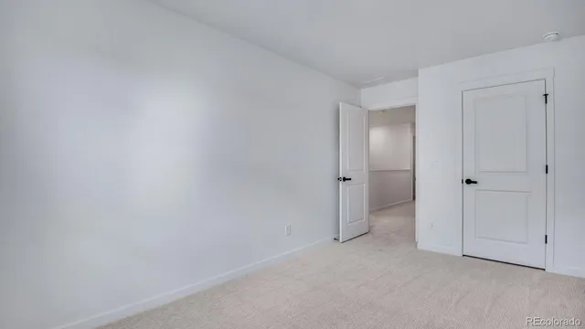 a bathroom with a bathtub shower sink vanity and toilet