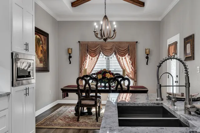 a view of a dining room with furniture