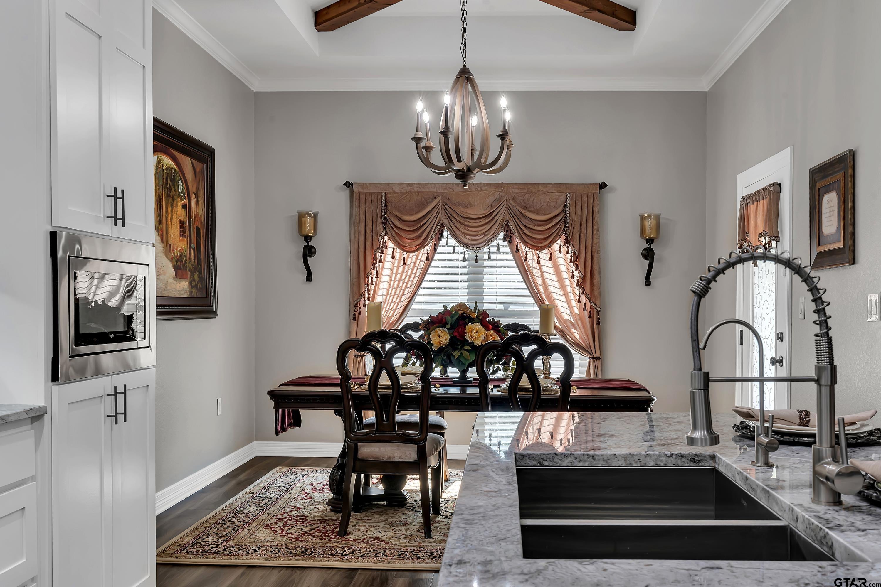 8199 Cr 314 Street South Laneville, TX 75667 - Photo 15 of 47 a view of a dining room with furniture