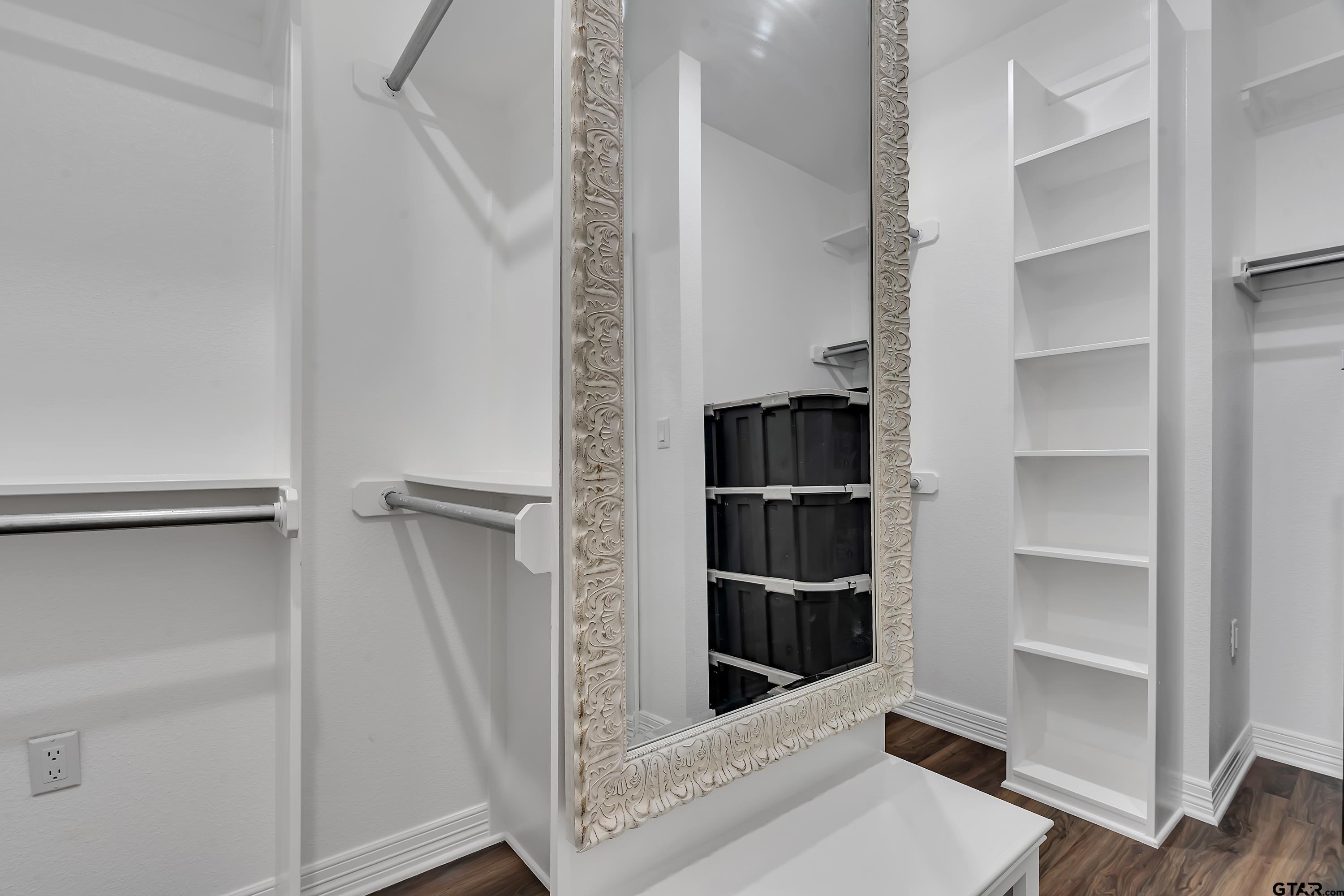 8199 Cr 314 Street South Laneville, TX 75667 - Photo 24 of 47 a view of walk in closet with empty racks