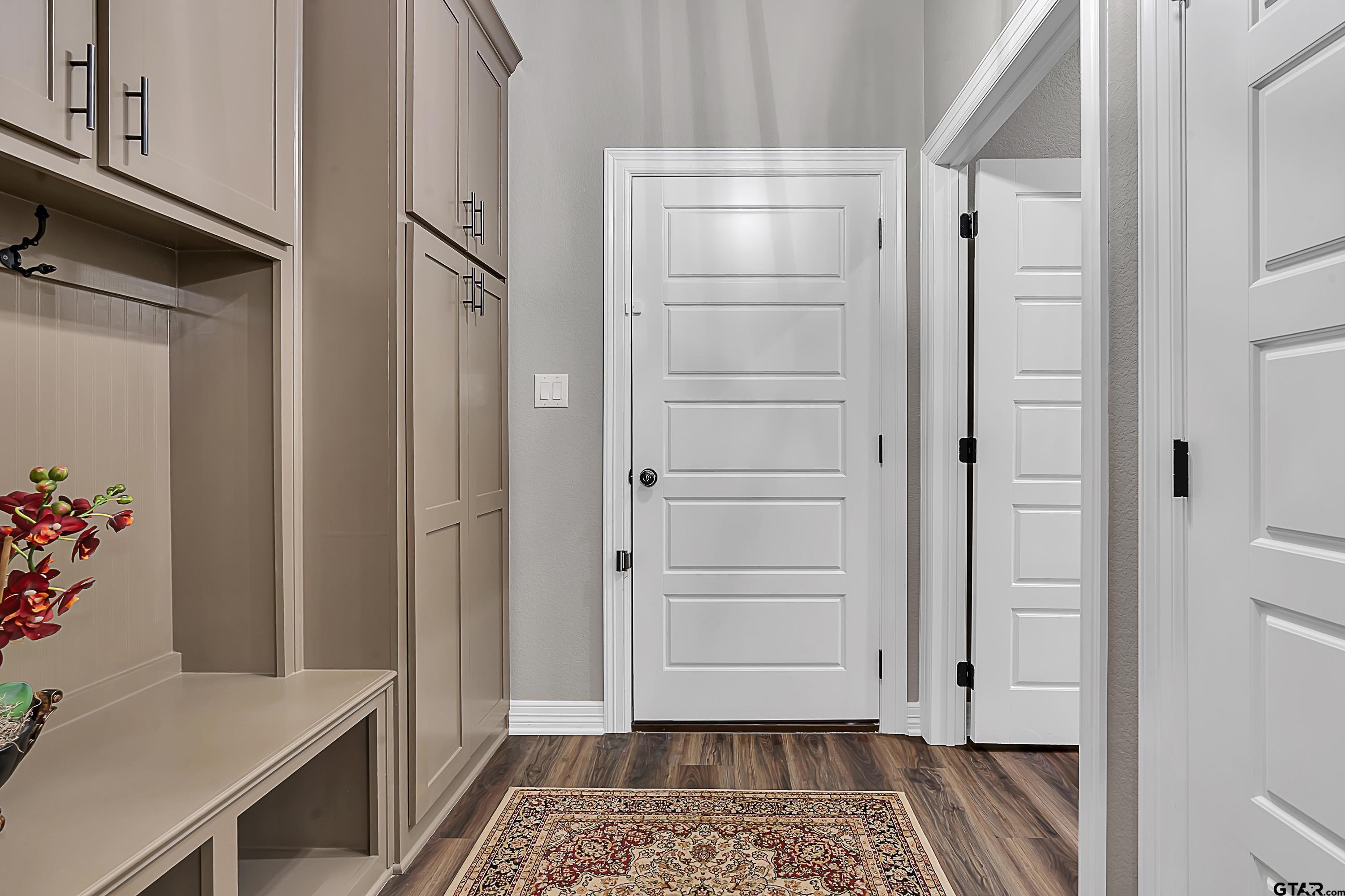 8199 Cr 314 Street South Laneville, TX 75667 - Photo 31 of 47 a view of bathroom with a sink and wooden floor